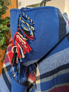 Blue winter poncho with fringed hood